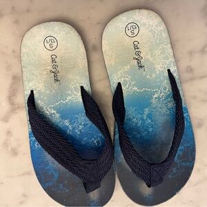 Cat and Jack flip flops.
